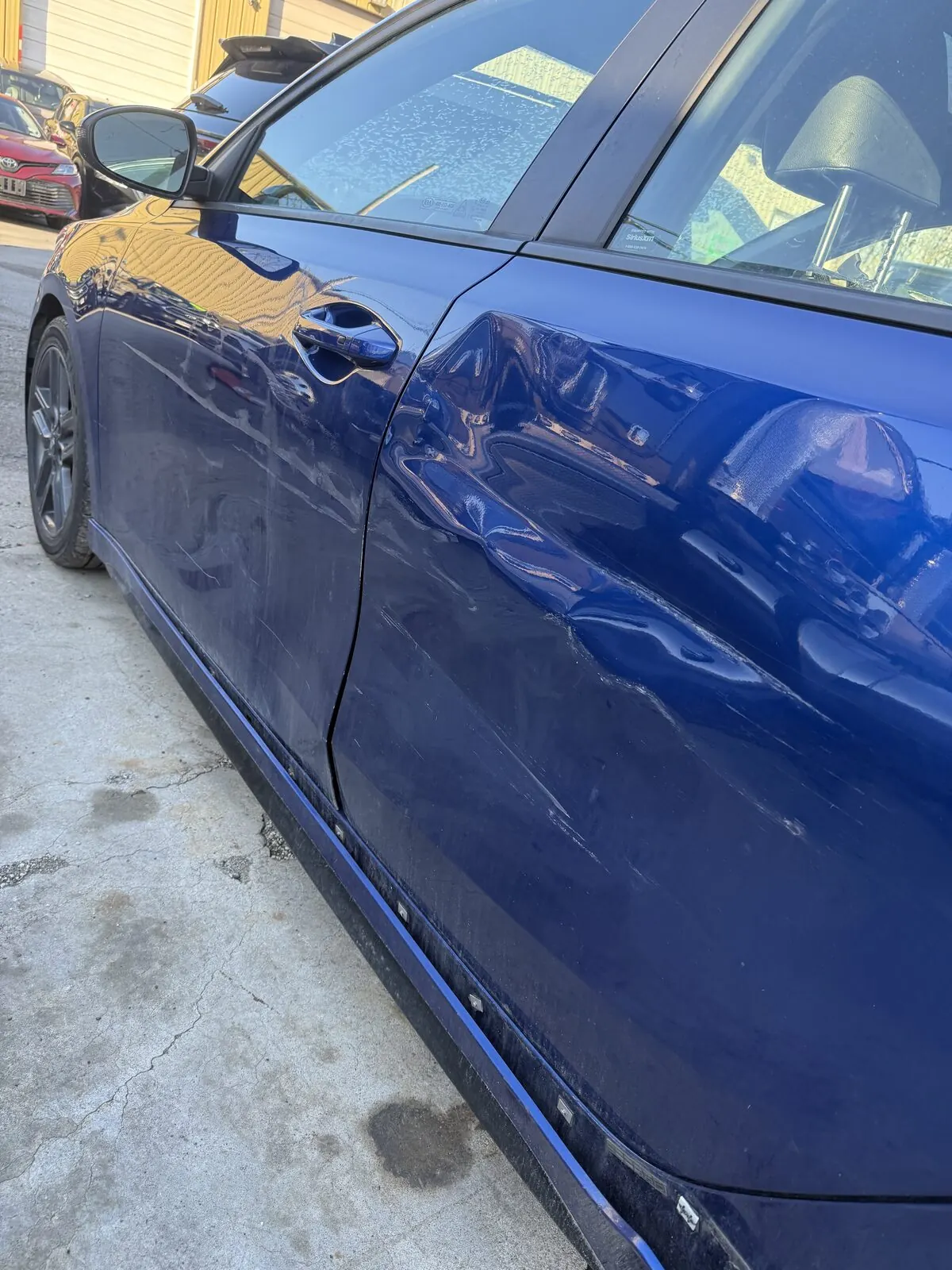 Rear quarter panel repaired and refinished after collision damage