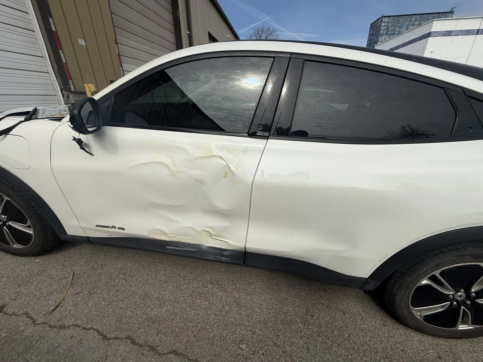 Door panel after dent repair and paint at Best Finish Auto Body